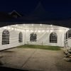 String Lighting Rentals Illuminating an Outdoor Evening Event