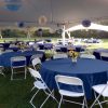 Marquee tent setup with White Folding Chairs and Private Event in Surrey