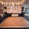 12x16 wood dance floor rental at Neptune Palace Seafood Restaurant in Burnaby BC with bokeh backdrop screen