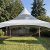 20x20 clear top high peak marquee tent set up on a private backyard lawn in Maple Ridge, BC